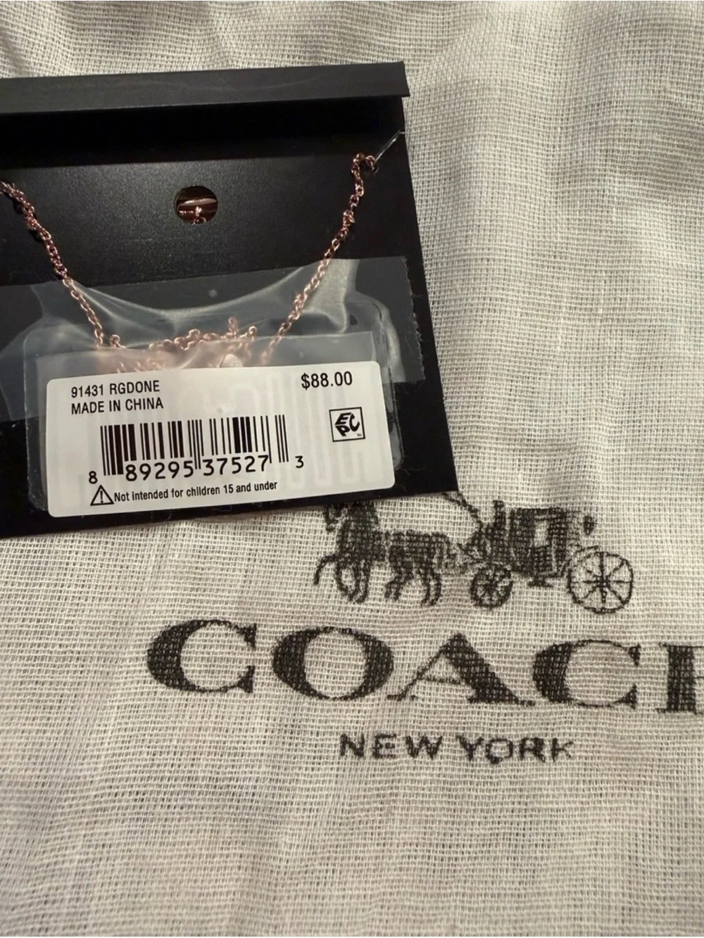 Coach necklace rose